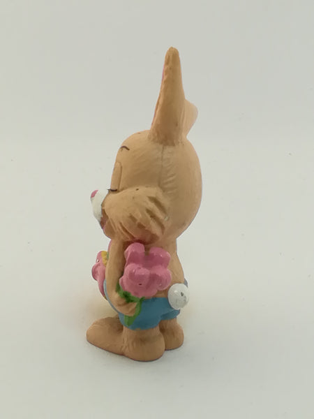 Small Bunny Rabbit Holding Easter Eggs in Basket
