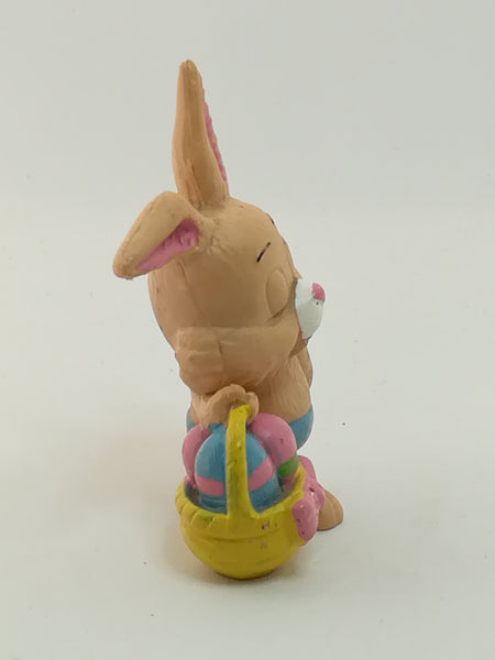 Small Bunny Rabbit Holding Easter Eggs in Basket