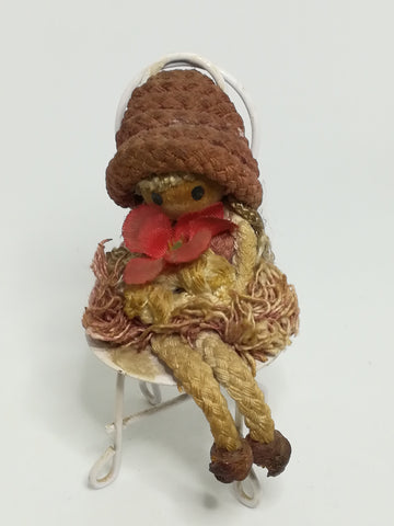 Small Wooden Brown Doll on Chair