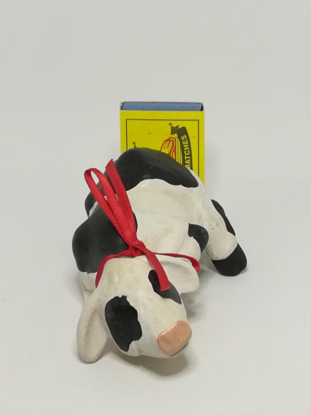 Small Ceramic Black & White Cow with Red Ribbon Around The Neck