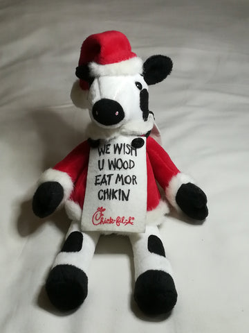 Black & White Cow Dressed in Father Christmas Suit
