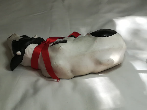 Black & White Ceramic Cow with Red Ribbon Around The Neck